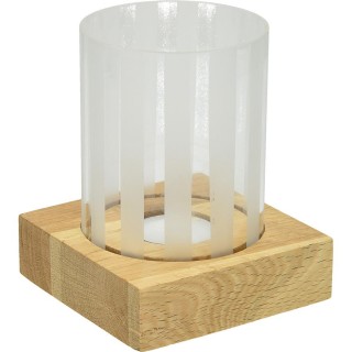 Glass candle holder on a wood base